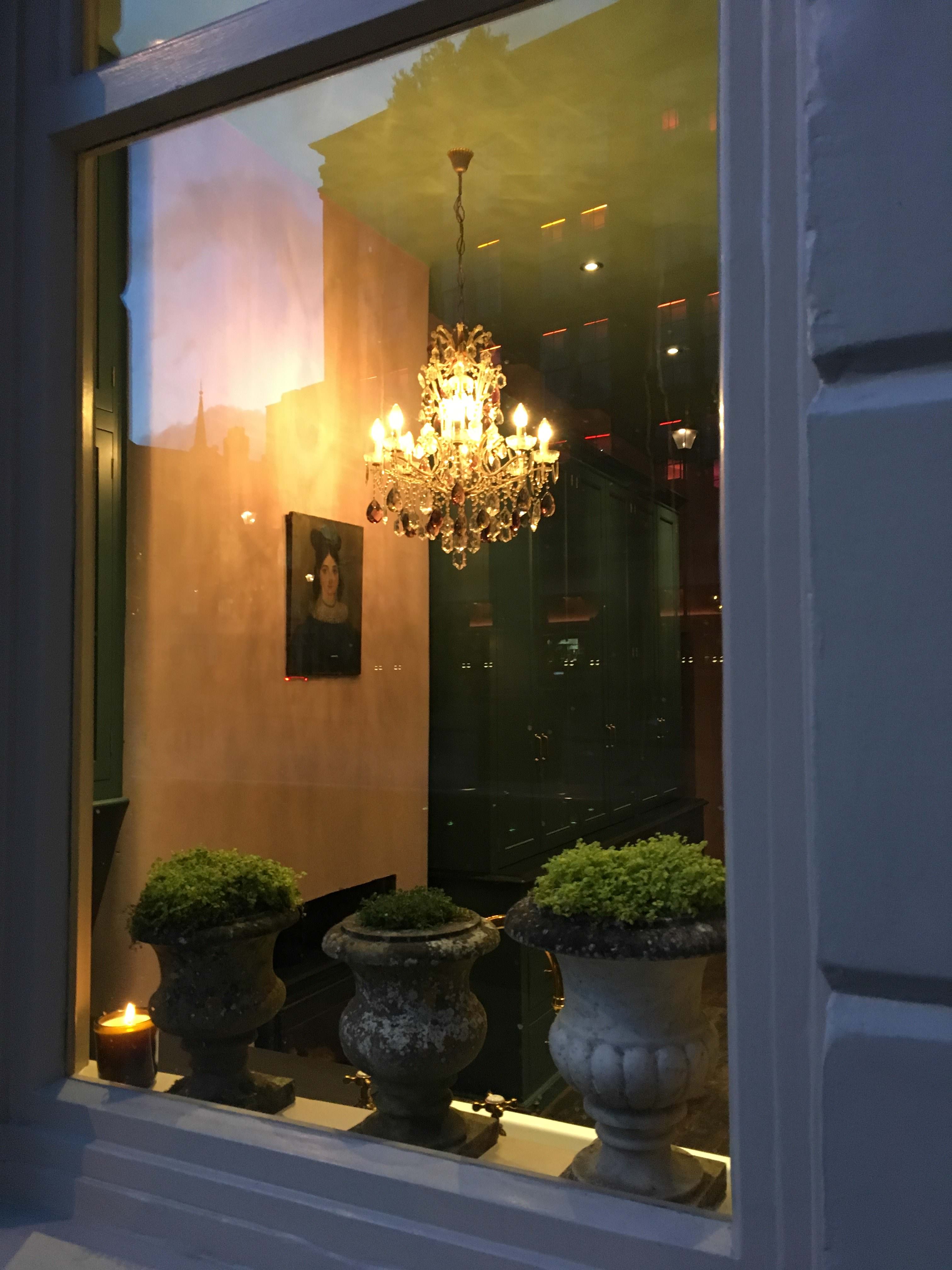 A peek through the window at dusk on St John Square