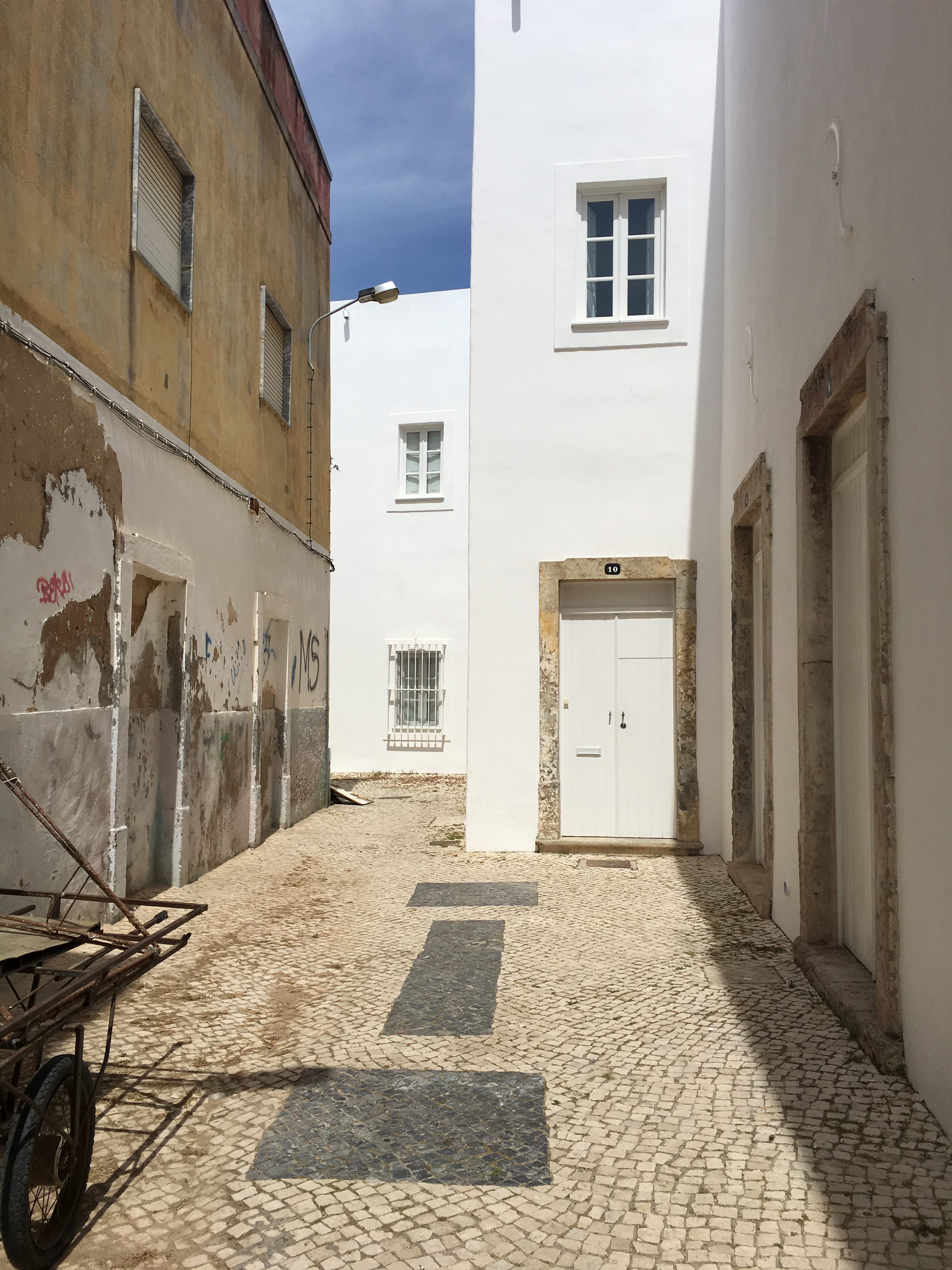 The front door to Convento, no signs, just freshly painted and down a cobbled street.