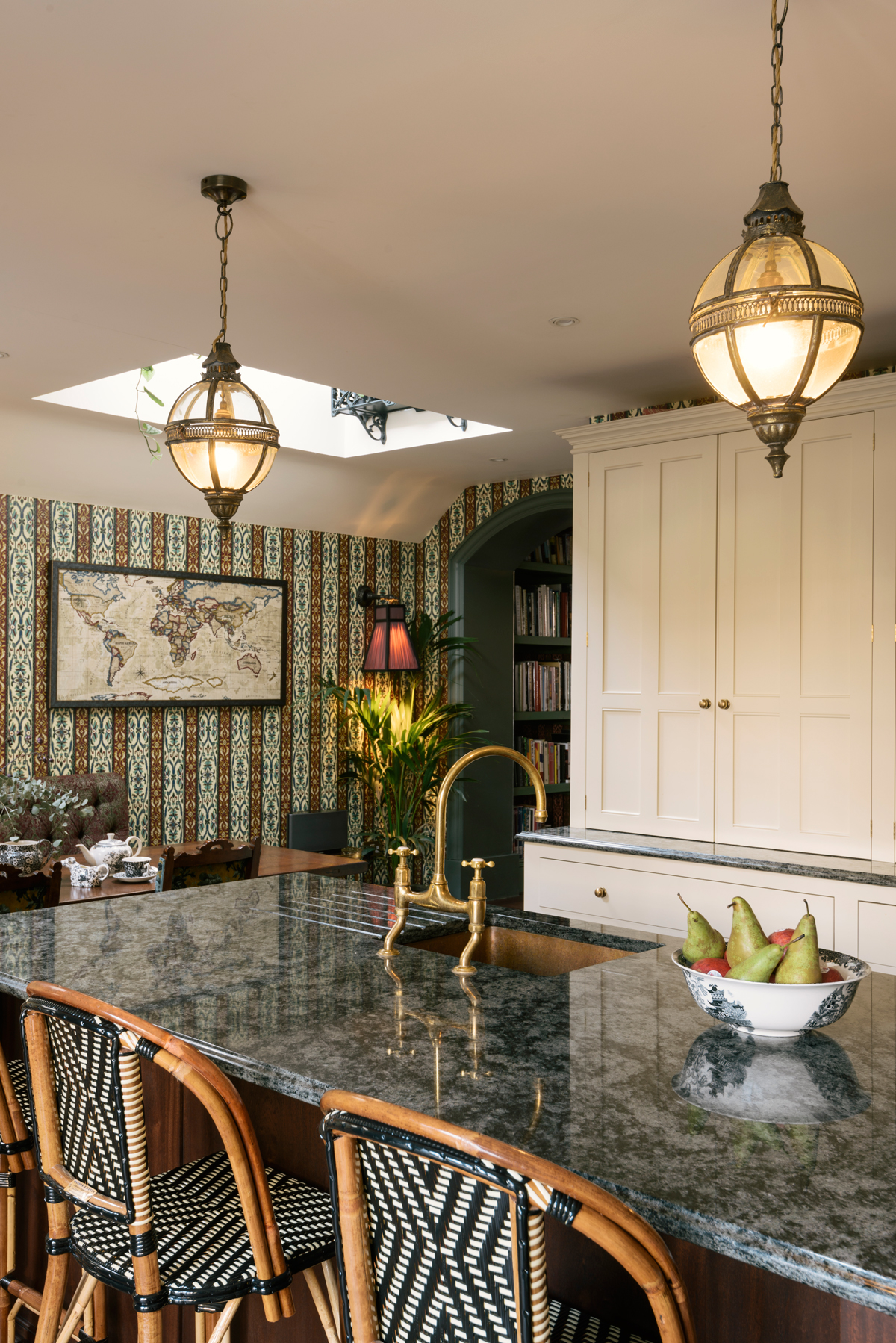 Tall bespoke cupboards painted in Linen kept the room feeling bright and fresh.