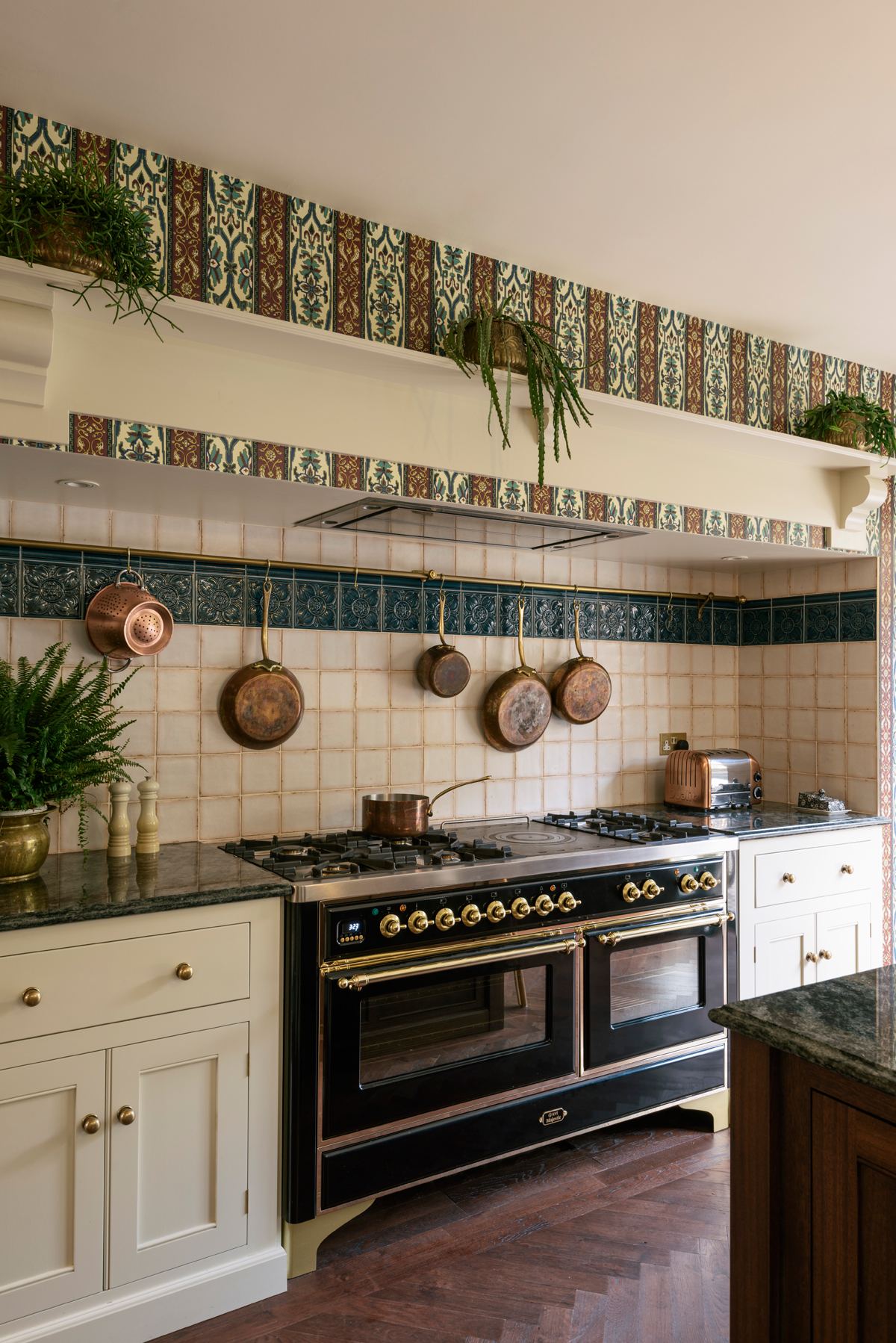 Beautifully worn tiles were used for the splashback, they're from Fired Earth but look as though they could always have been there