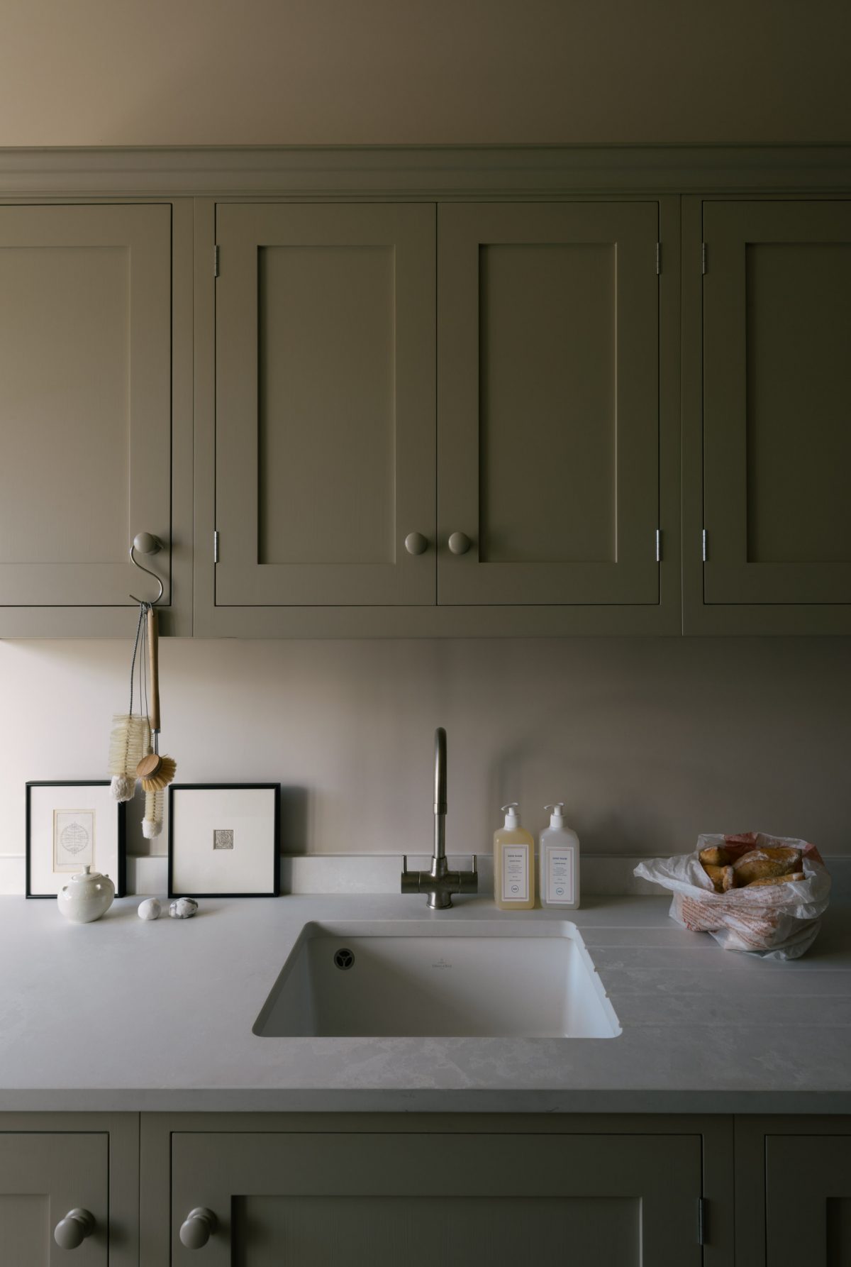 The Bath Kitchen features a manmade surface by Caesarstone, it looks pale, sleek and will take a great deal of use. 