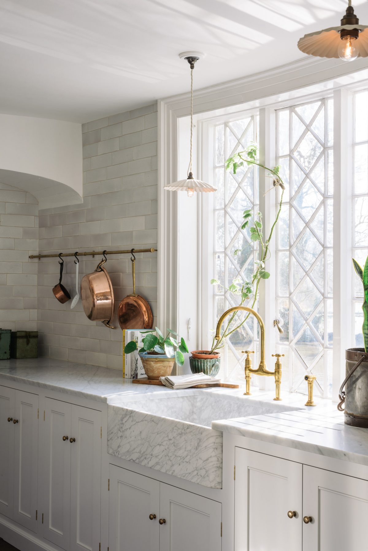 Carrara marble worktops and a deVOL Milano Penthouse marble sink, a dreamy combination.
