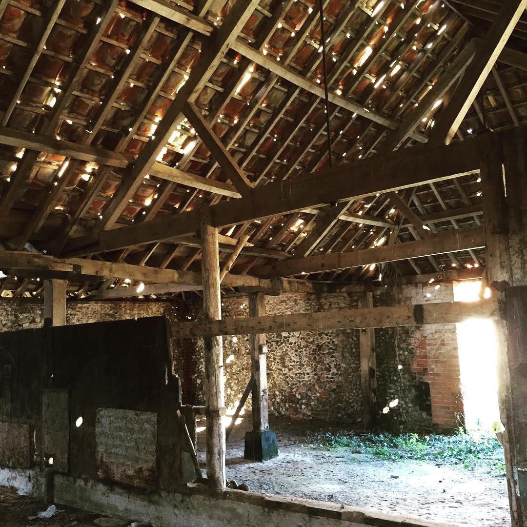 An old cattle shed before a beautiful renovation