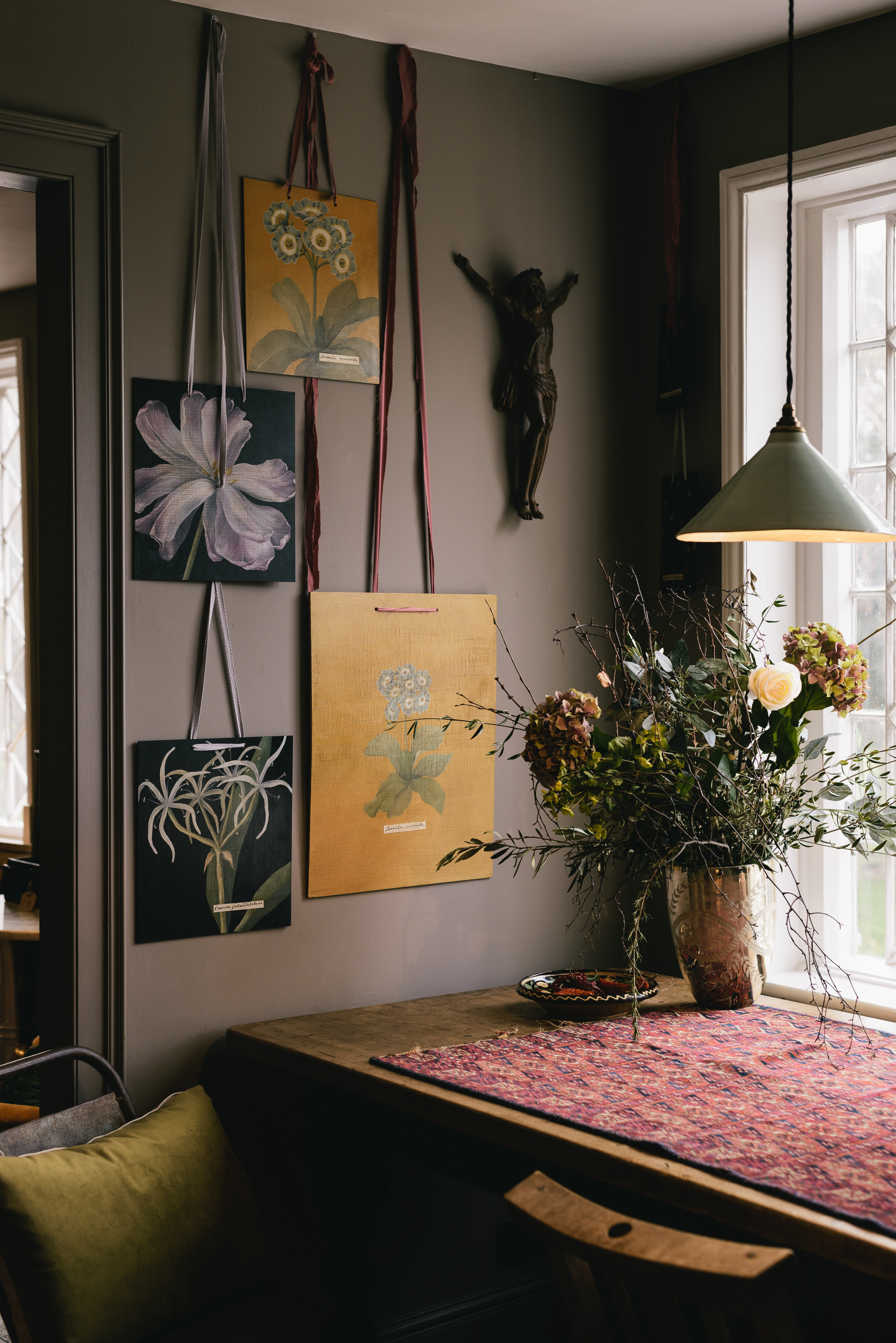 Hanging botanical paintings created by our in-house Decorative Artist, Rosie.