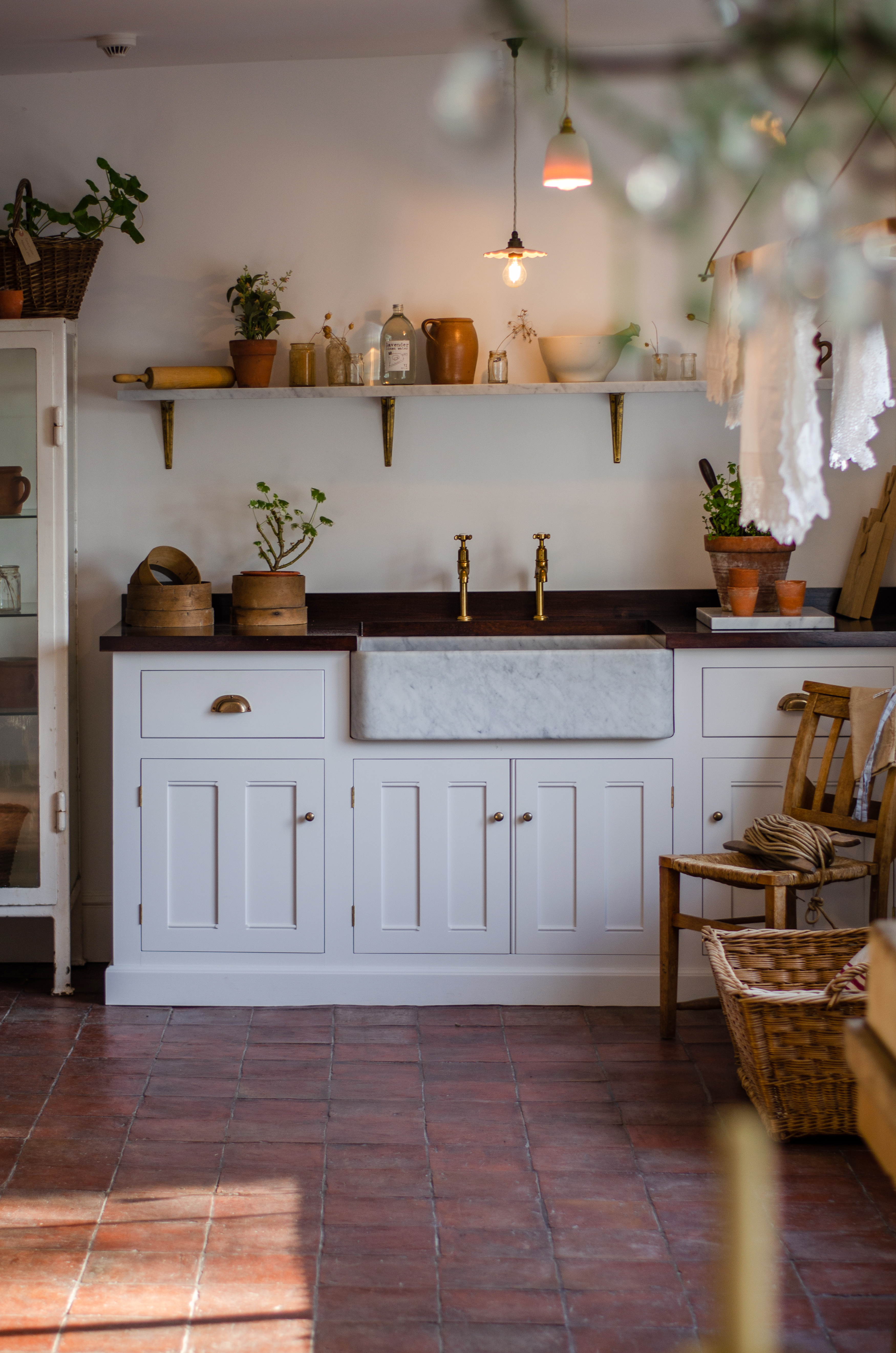 Our grand Classic Millhouse Scullery Kitchen accentuated with plenty of greenery.