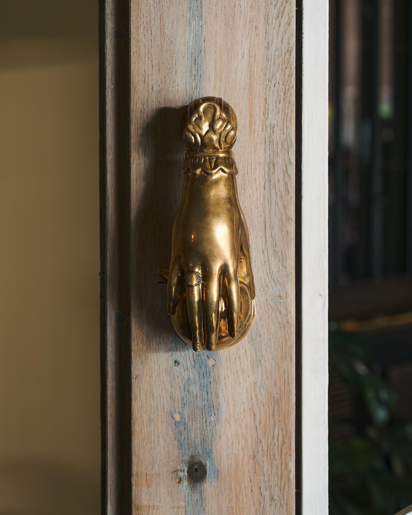 The Weaver's Hand Door Knocker