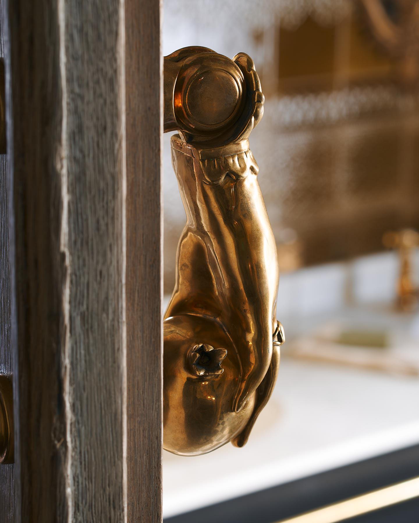 The Weaver's Hand Door Knocker