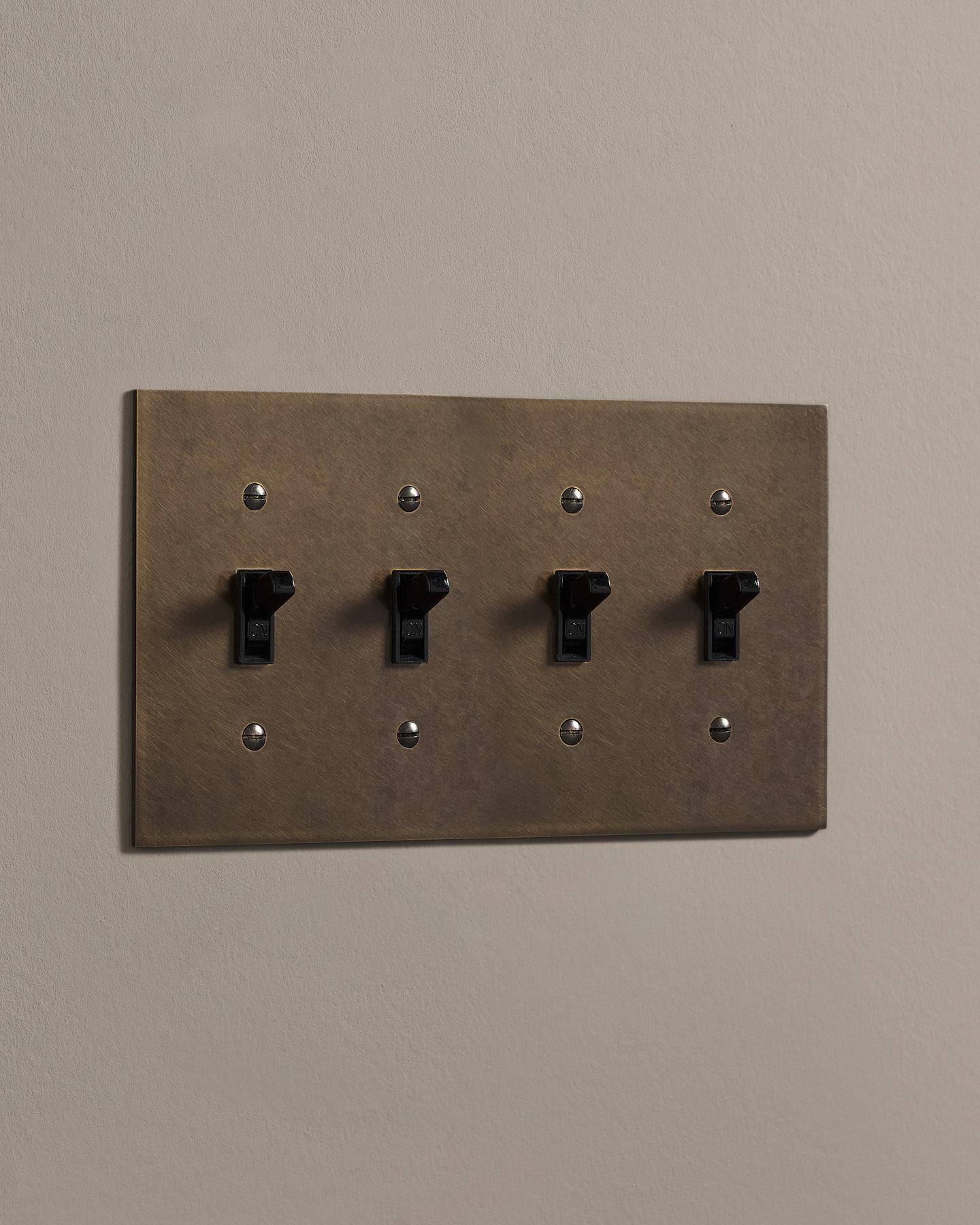 deVOL Oxidised Brass Toggle Switch Plate - 4 Gang