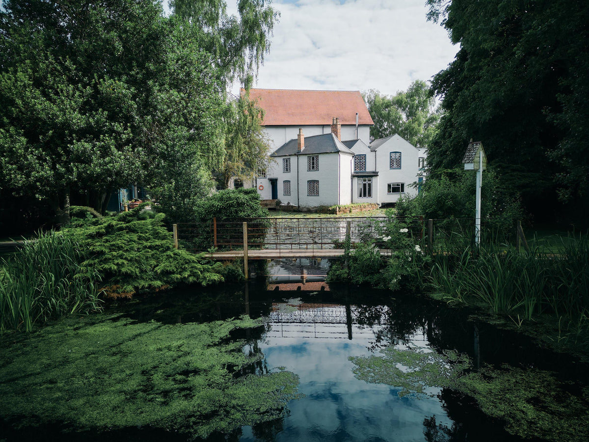 The home of deVOL kitchens in Leicestershire sits beside the Cotes pond and lush green British countryside.