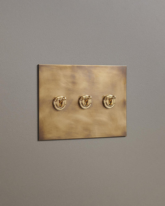 F&L Aged Brass Toggle Switch - 3 Gang