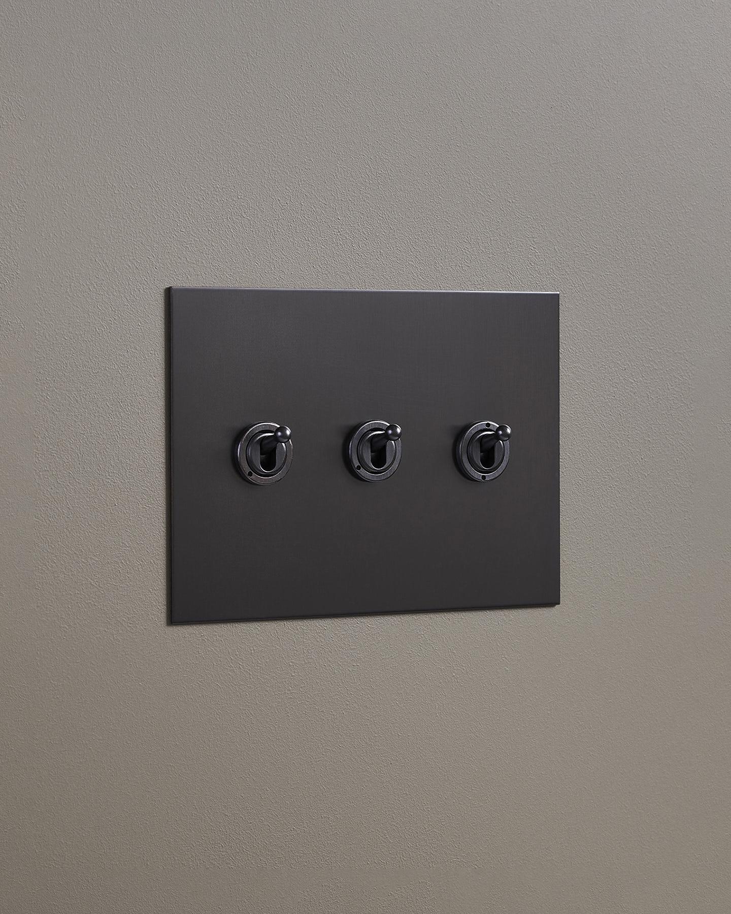 F&L Antique Bronze Toggle Switch - 3 Gang