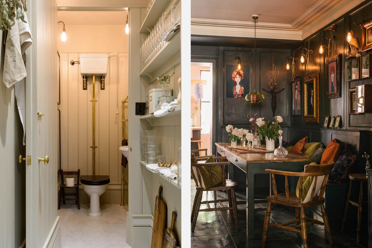 On the left side is a small mushroom utility room with four shelves, peg rails, and a bathroom at the end of the room. On the right side is a chic dinning corner with an L-shaped shaker bench, a millhouse refectory table, and a variety of vintage furniture, vibrant pillows, framed art pieces, wall lights, and white roses.
