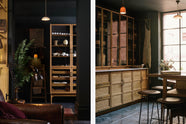 A cool and elegant Haberdasher’s collection features a large prep table with a copper worktop, a pantry run with tambour base cabinets, and glazed countertop cabinets. Adorned with vintage furniture and items, artisan ceramics, the deVOL porcelain light collection, Creedy stools, assorted containers, bottles, and a stunning bouquet of dried flowers, this space creates an atmospheric social bar.