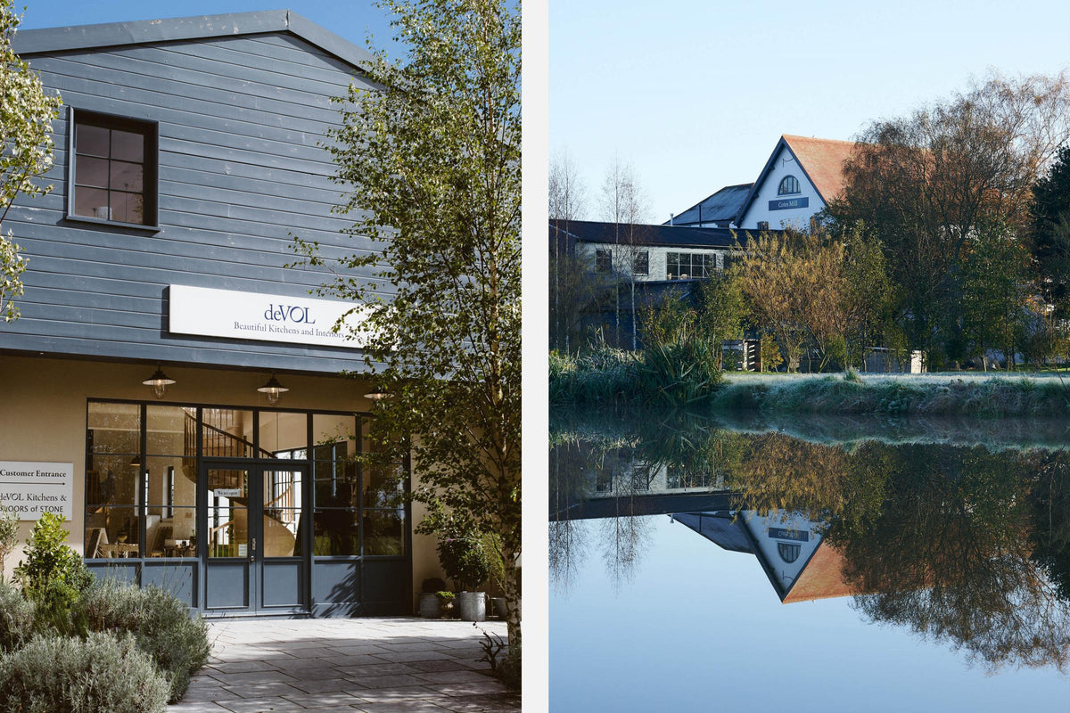 Two beautiful images of the Cotes Mill, Leicestershire showroom: one close-up of the front entrance of the deVOL blue historic building, and one farther back, with the River Soar reflecting the showroom.