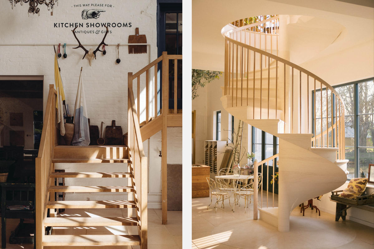 A bright and open space with a solid limestone spiral staircase, and a wooden staircase towards the kitchen showrooms. Decorated with antique furniture, and deVOL curated vintage embelishments.