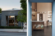 An external view of our LA showroom, taken at dusk, with dark-grey rendered walls and a large bay window to the front.