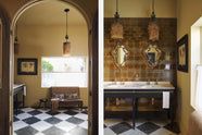 A beautiful butter-yellow powder room, you’ll find a black twin Victorian washstand, tall sepia lace market tiles, and a Parisian chequered marble floor. Paired with antique mirrors, pendant lights, vintage paintings, and framed pressed botanical artworks, the room exudes a glamorous, vintage charm.