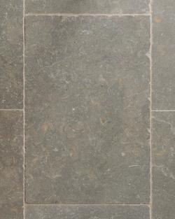 An overhead view of Seagrass Tumbled Limestone flooring.