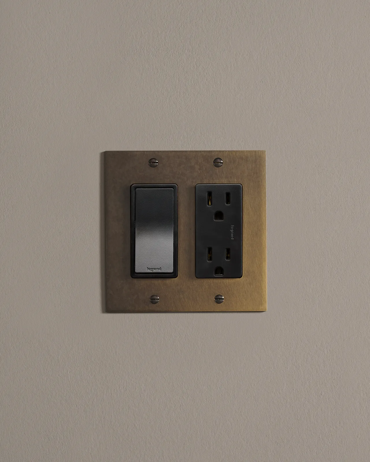 a front on shot of a mixed module on an oxidised brass plate.