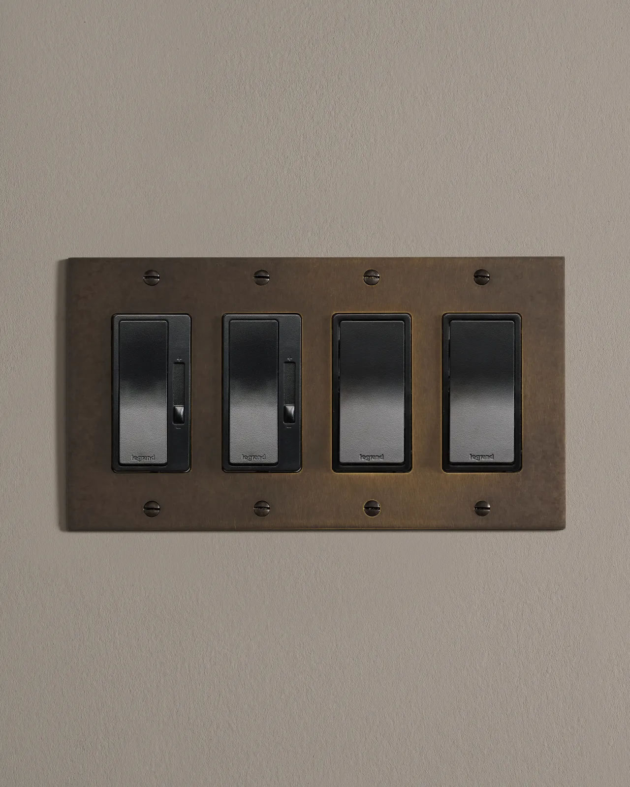 a front on shot of a mixed module on an oxidised brass plate.