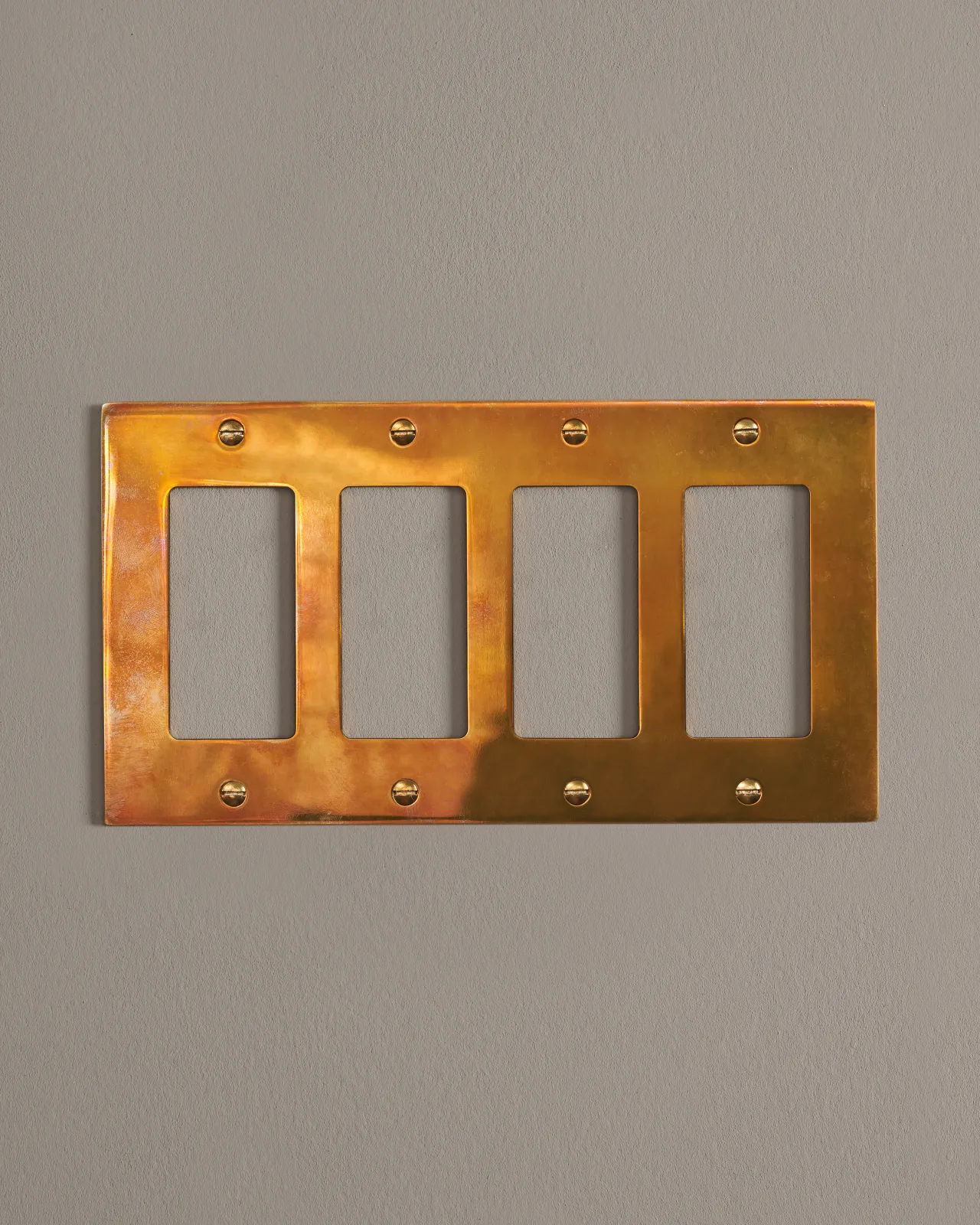 a front on shot of the decora cover plate in heirloom brass.
