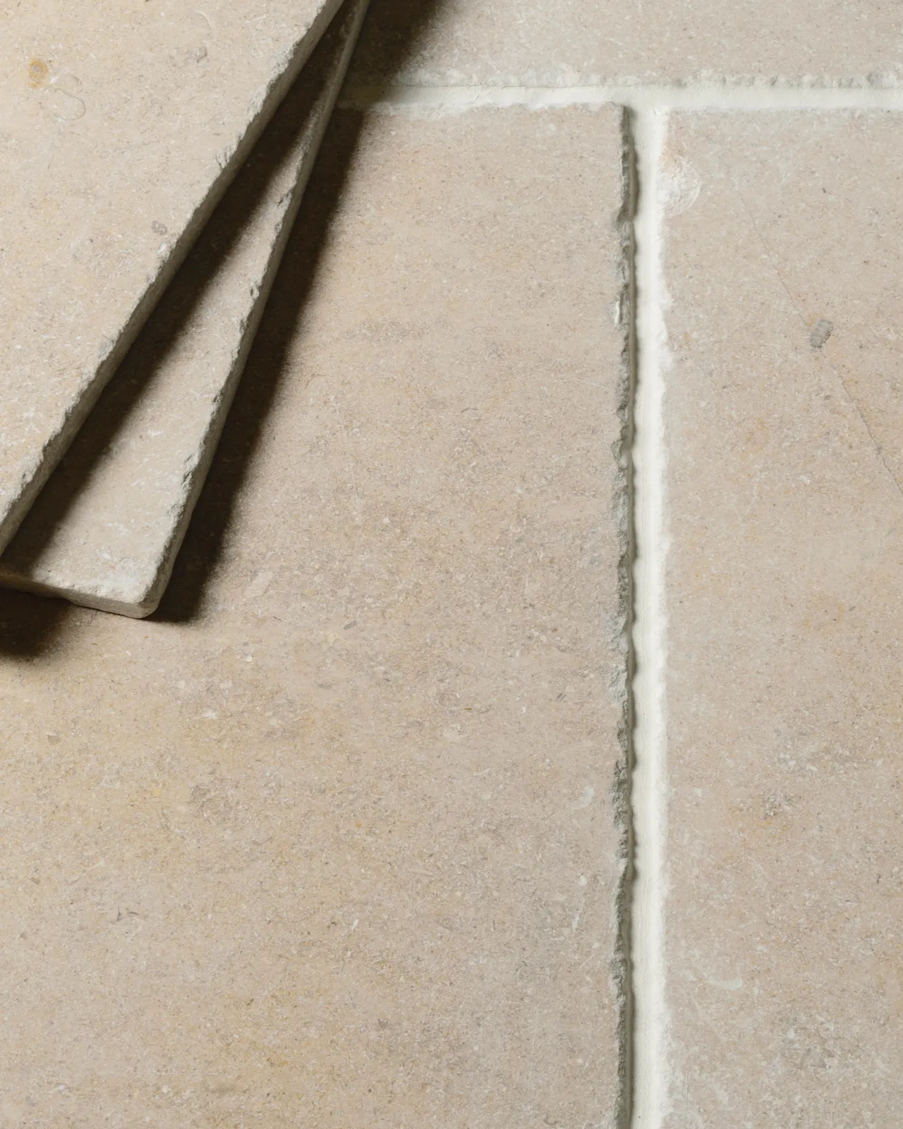 A close-up view of some Vintage Bronze Limestone tiles.