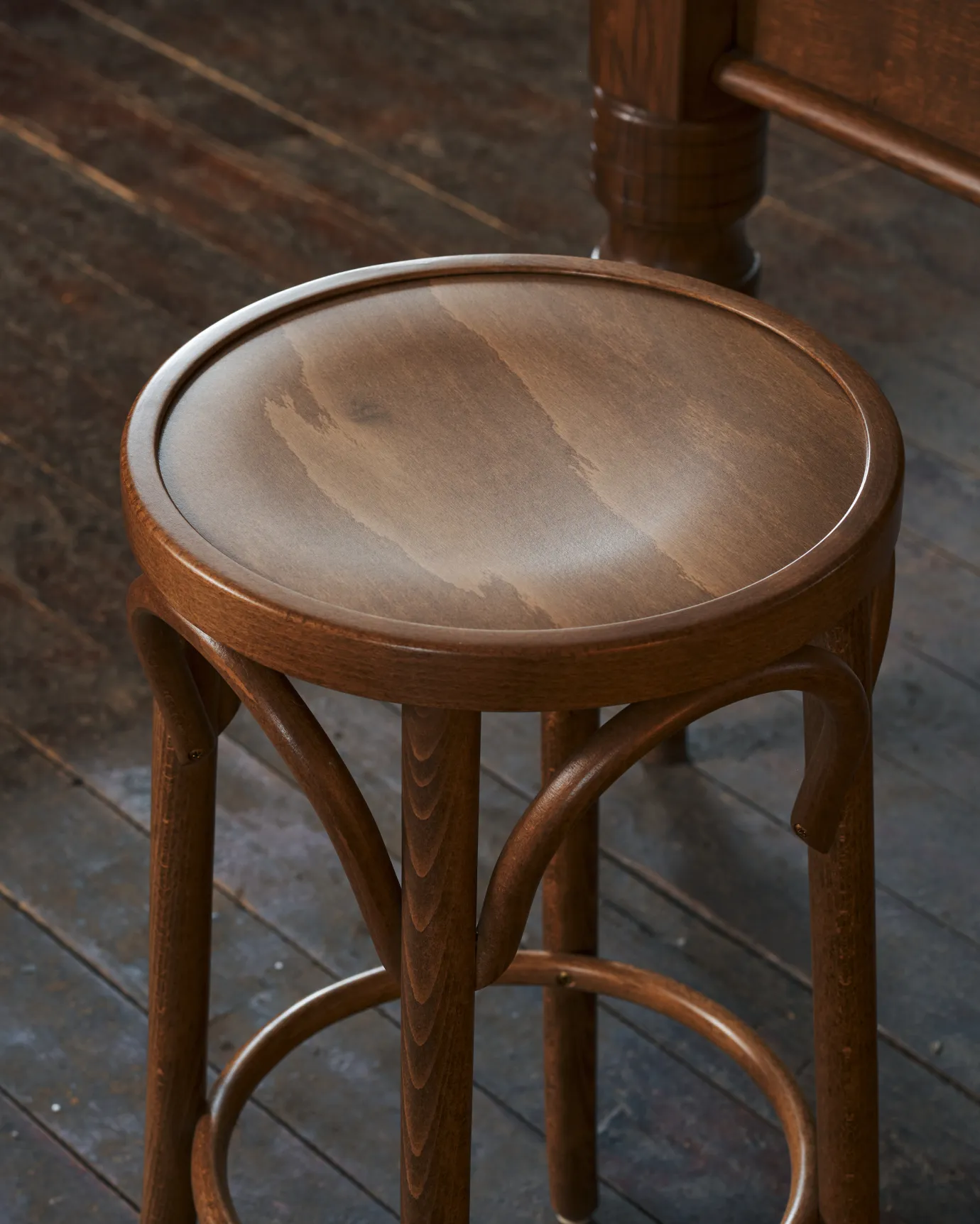 a close up of the classic bentwood cafe stool.